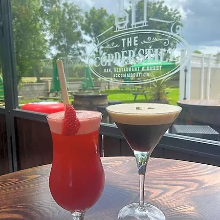 The Copper Still Bar Restaurant & Boutique 酒店
